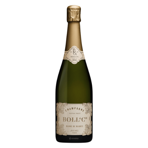 Bottle of NV Boll & Cie Blanc de Blancs Extra Brut Champagne with ornate cream and gold label and matching foil, showcasing classic French elegance.